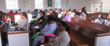 People seated at Children's Summit at Epworth